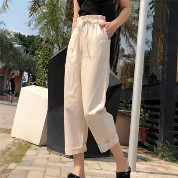 Mulheres de calças de 2021 a coleção primavera / verão em moda feminina cintura alta sólidas soltas harém calça lápis, calças casuais, calças cargo streetwear